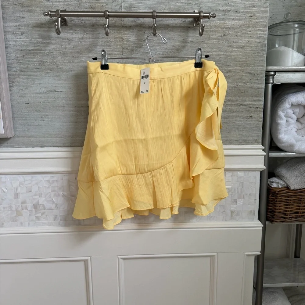 NWT new medium Anthropologie Maeve ruffle mini skirt yellow wrap tie